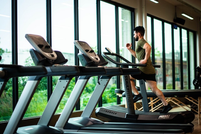 Man running on a treadmill.