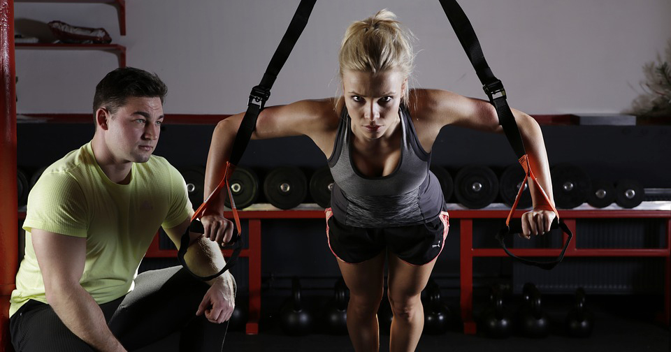 image of working out with personal trainer