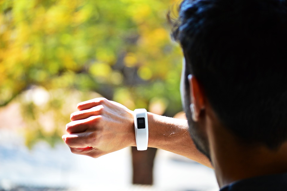 Man wearing Fitbit on his wrist.