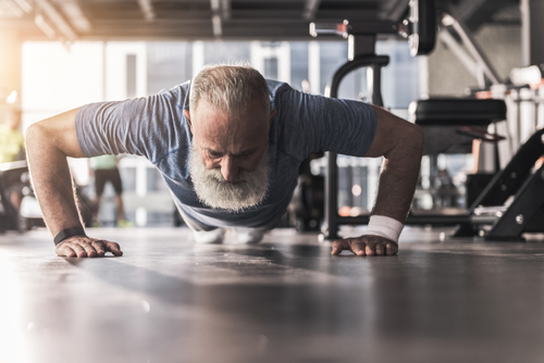 Older man doing push-ups.