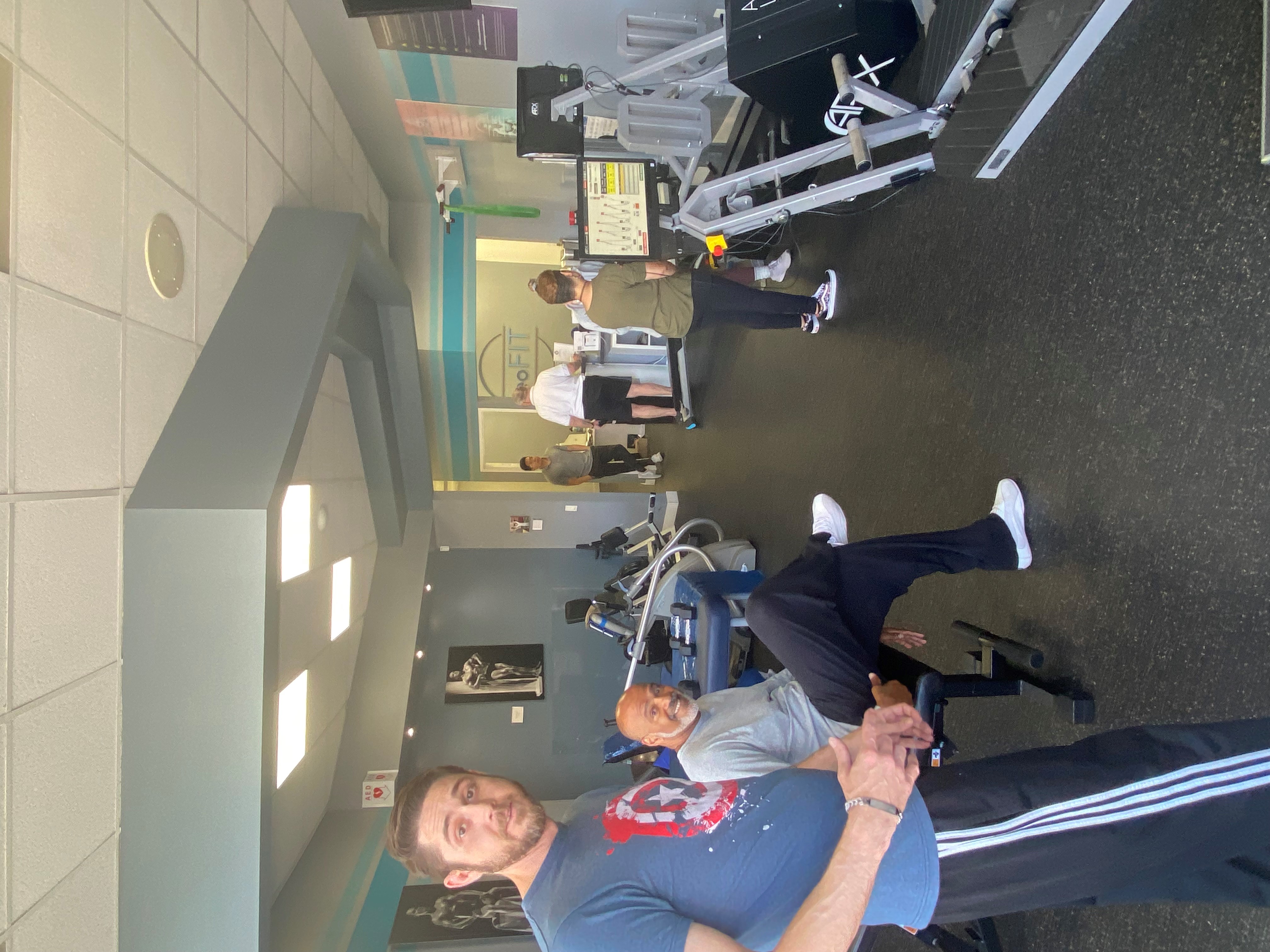 Clients working out with personal trainers at Leo's Fitness Lab.