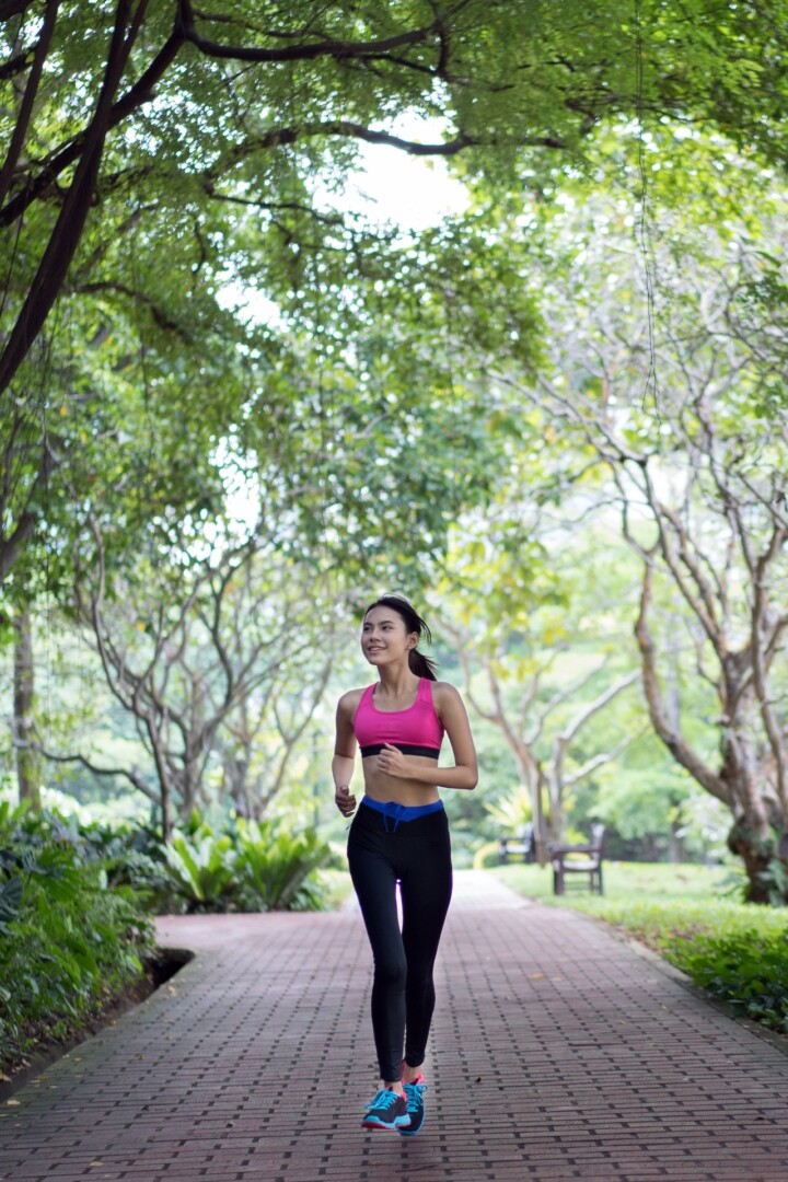 Woman running in park.