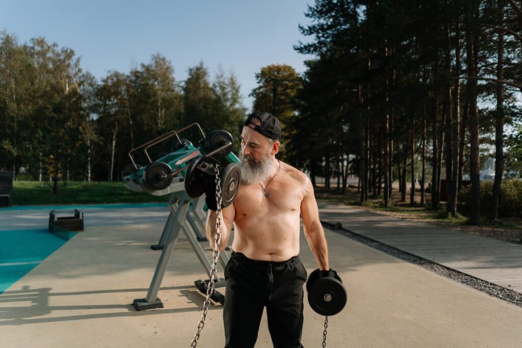 Older man working out outdoords.