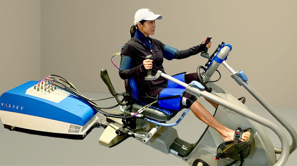 Woman training on Vasper machine.