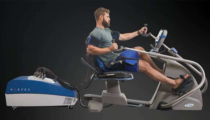 an image of a man with a beard using a Vasper exercise machine